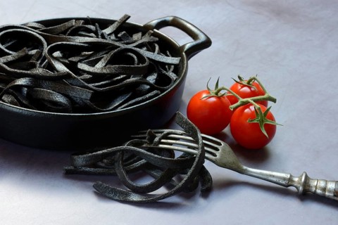 Black pasta coloured with squid ink in shell, Taglioni al Nero di Seppia, Italy, Europe