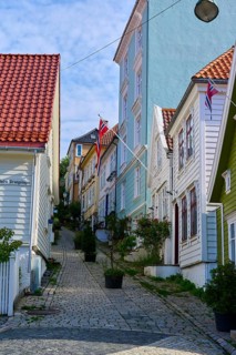 Historic town centre of Bergen with narrow streets and cobblestones surrounded by traditional