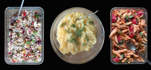 Rice and potato and pasta salad in glass bowls on a black background, Bavaria, Germany, Europe