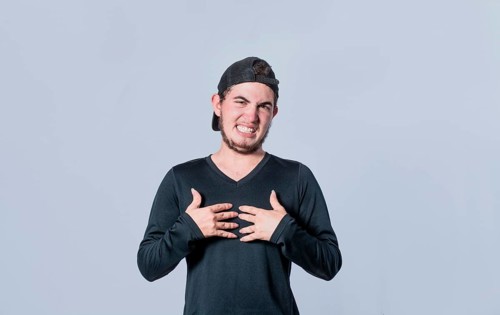 Guy with disgust expression, man with disgust expression with hands on his chest, man with disgust
