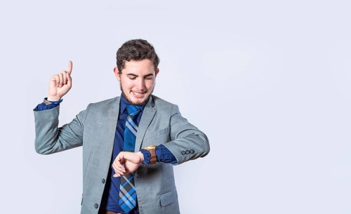 Business man shocked with a new idea, surprised man in suit jacket pointing finger up, business man