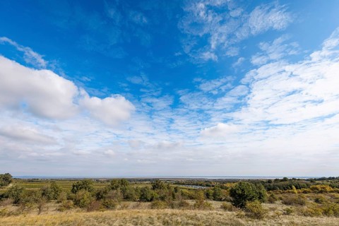 Cloud formation in the sky, low horizon, green landscape, St. Margarethen, Burgenland, Austria,