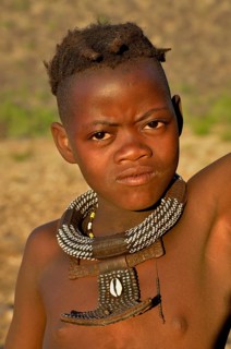 Young shepherdess from the Himba people, Ombombo, Kaokoland, Kunene, Namibia, Africa