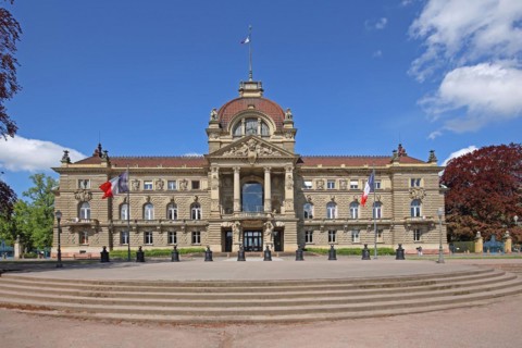 Palais du Rhin built in 1889 with open staircase, former imperial palace, French national flag,