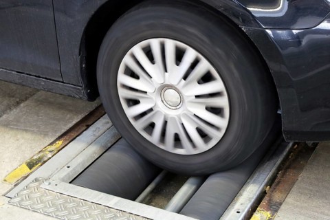 Car on the brake test bench (brake test)