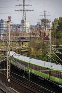Flixtrain train on the railway line between Mülheim an der Ruhr, and Duisburg, busy railway line,