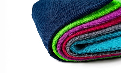 A stack of multicolored, microfiber cloths, for cleaning