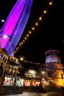 Christmas market with a ferris wheel on Burgplatz square, historic town centre, Dusseldorf, North