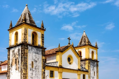Baroque church tower with blue sky of the city of Olinda, Olinda, Pernambuco, Brazil, South America