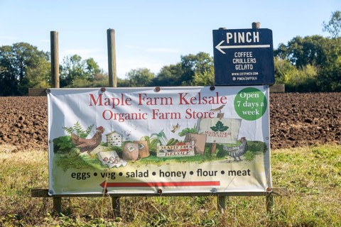 Banner sign for Maple Farm organic farm store shop, Kelsale, Suffolk, England, UK