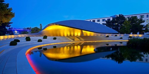 Illuminated Porsche Pavilion in the evening, Autostadt, Volkswagen AG, Wolfsburg, Lower Saxony,