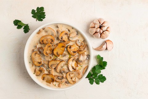 Champignons in creamy garlic sauce, with herbs and spices, gravy, sauce, no people