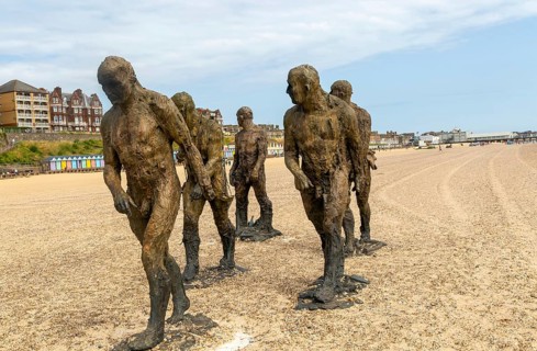 'Walking Men' artwork bronze sculptures by Laurence Edwards, South Beach, Lowestoft, Suffolk,