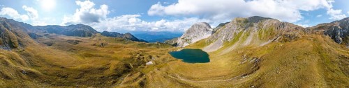 Aerial view, Alpine panorama, mountain hut Obstanserseehütte at the mountain lake Obstansersee,