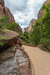 Rock formations along a paved portion of the Riverside Walk in Zion National Park, Utah