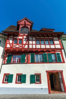Historic street, Fronhof, Stein am Rhein, half-timbered house Fronhof, shutters, gate entrance,
