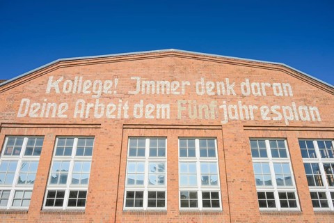 Inscription, colleague! Always remember your work to the five-year plan, Stage 19, Filmhalle,