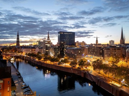 Aerial view of Hamburg's Speicherstadt warehouse district on the Zollkanal during the blue hour,