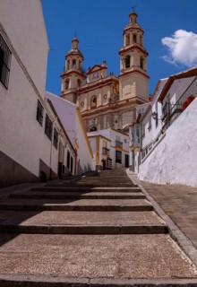 White village with La Encarnacion church on the Moorish hill, Olvera, Andalusia, Spain, Europe