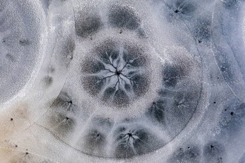 Aerial view of ice formations on a frozen lake, winter, Riegsee, Alpine foothills, Upper Bavaria,