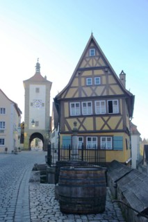 Siebersturm as part of the historic town fortifications and yellow half-timbered house, town gate,