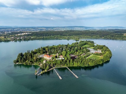 The island of Mainau in Lake Constance with the jetty and the baroque Mainau Castle, built between