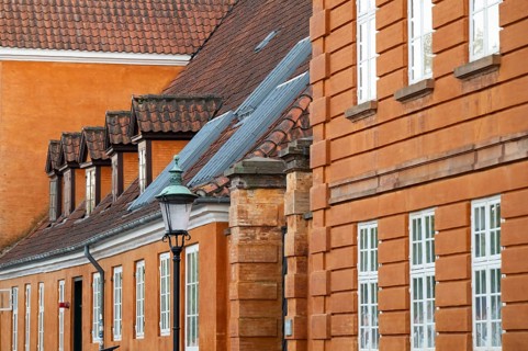 Rusty red historic houses, Frederiksholms Canal, Copenhagen, Denmark, Europe