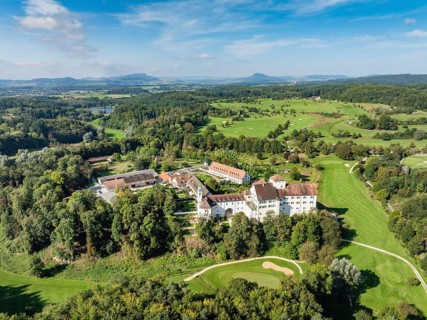 Aerial view of Langenstein Castle near Eigeltingen with surrounding golf course, the Hegau