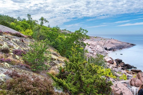 Bizarre coastal landscape of granite rocks on the Blue Maiden (Bla Jungfrun), an island and