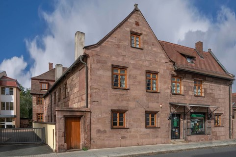 Bathing castle, former manor house, core 1612, rebuilt 1795, today residential building, main