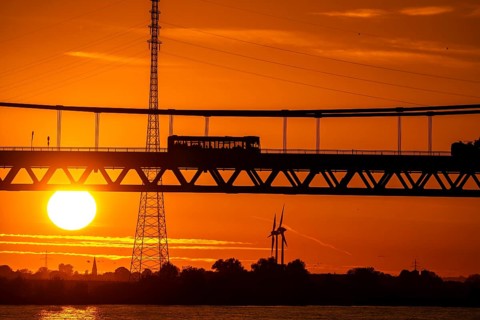 Traffic on the Rhine bridge Emmerich, federal road B220, evening light, with 803 m the longest