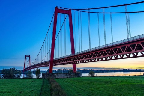 The Emmerich Rhine Bridge, federal road B220, evening light, at 803 m the longest suspension bridge