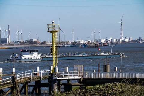 The port of Antwerp, on the Scheldt, is the second largest seaport in Europe, barges on the