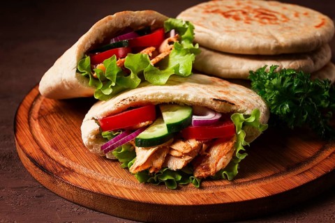 Shawarma in pita bread, chicken, with vegetables, homemade, no people