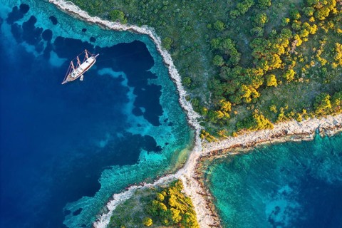 Bay with sailing boat, Pakleni or Paklinski Islands off the island of Hvar, Dalmatia, Croatia,