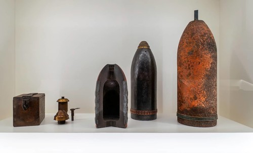 WW1 artillery shells, fuzes and sectioned projectile on display in museum at Fort van Liezele near