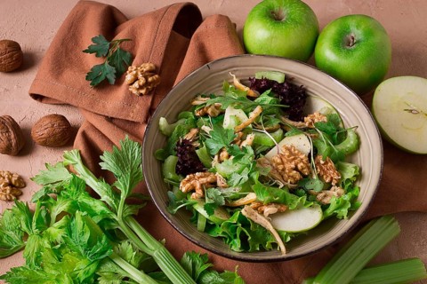 Fresh, Waldorf salad, celery stalk with chicken, apple and walnut, grapes, herbs, homemade, no