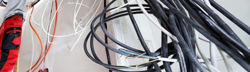 Professional electrical installation on a building shell
