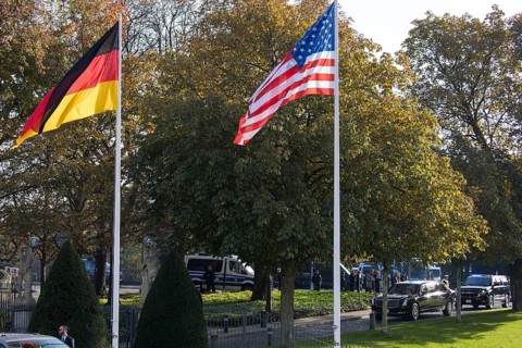 Joe Biden (46th President of the United States) drives past the flags of Germany, the USA and the