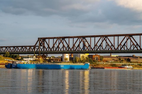 The railway bridge Duisburg-Hochfeld-Rheinhausen, over the Rhine, regional trains and many goods