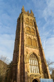 Golden afternoon winter sunshine, tower of minster church of Saint Magdalene, Taunton, Somerset,