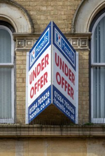 Under Offer sign commercial property Hazells estate agents, Stowmarket, Suffolk, England, UK