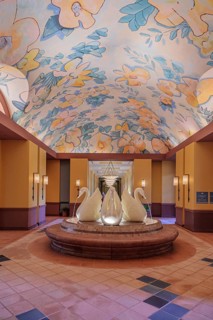 Interior water fountain with swans at the Swan Resort Hotel in Walt Disney World, Orlando, Florida,