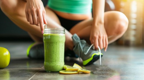 Female athlete drinking healthy organic detox kale and avocado smoothie after exercise, AI