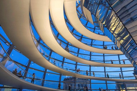 Visitors in the spiral-shaped Reichstag dome, Berlin, 21 May 2014