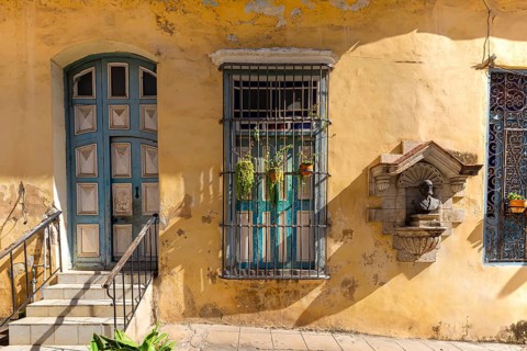 Scenic colorful Old Havana streets in historic city center (Havana Vieja) near Paseo El Prado and