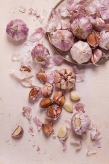 Fresh garlic on a white background, top view, food concept
