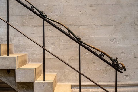 Metal figures on the banister leading to the gallery in Naumburg Cathedral, Saxony-Anhalt, Germany,