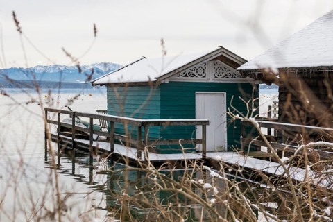 Boathouses with snow in winter, Tutzing, Lake Starnberg, Fünfseenland, Pfaffenwinkel, Upper