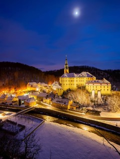 Winter evening in the Müglitz valley, impressively illuminated Weesenstein Castle at the blue hour,